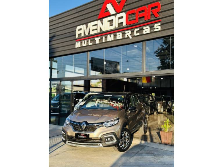 RENAULT - CAPTUR - 2022/2022 - Dourada - R$ 103.900,00